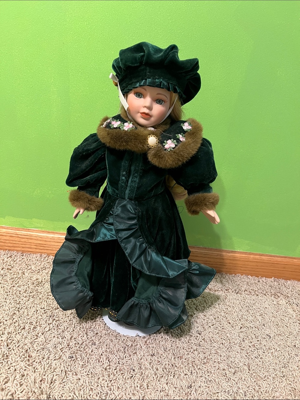 Collectible Green Velvet Porcelain Doll with Fur-Trim Dress